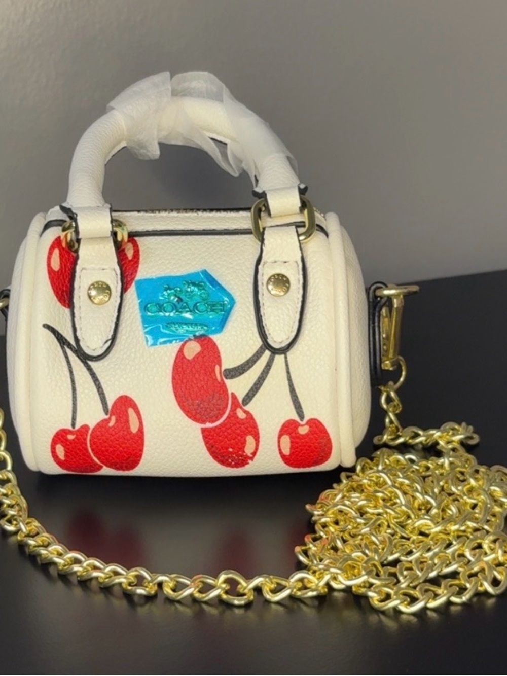 Coach White Mini Bag with Red Cherry Print and Gold Chain